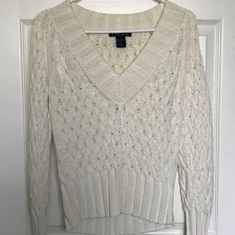 Cream cable-knit sweater